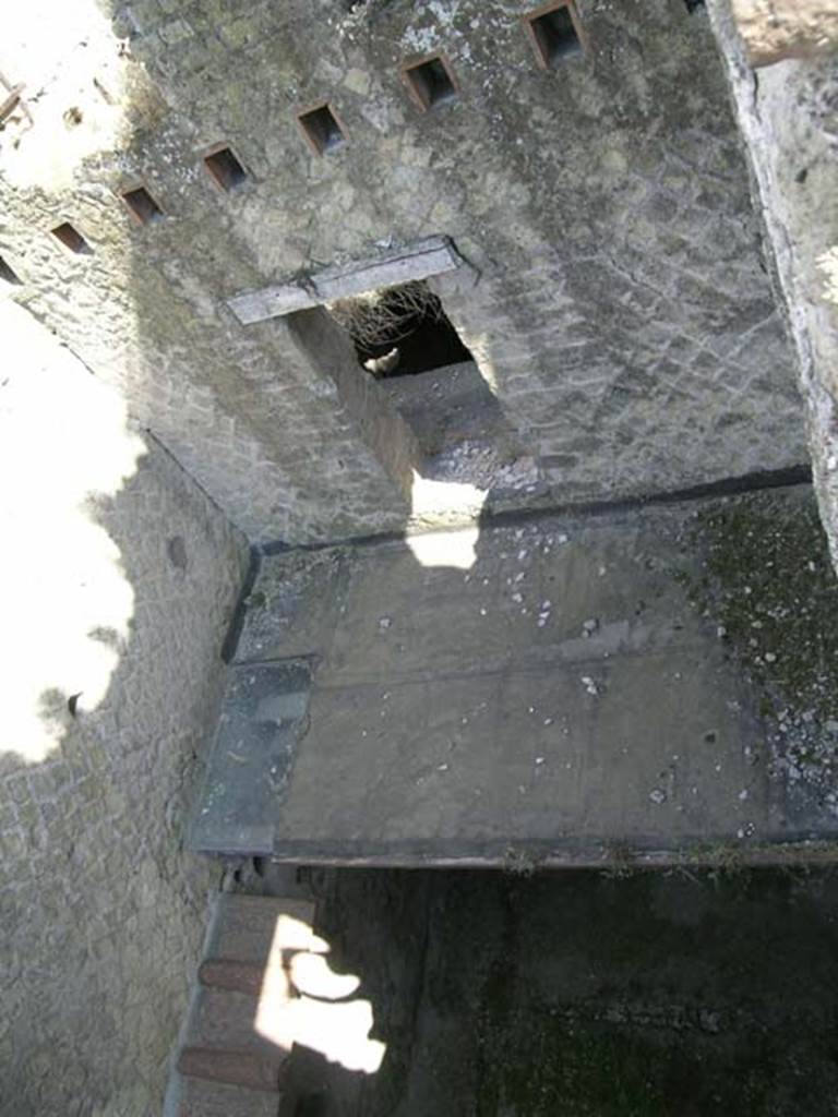 Ins. Orientalis II.9, Herculaneum. May 2006. Looking down onto area of mezzanine level, from upper floor. 
Photo courtesy of Nicolas Monteix.

