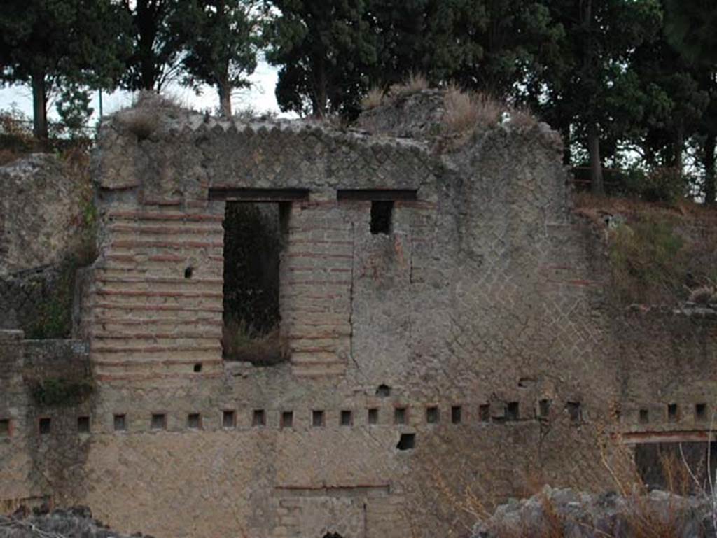 Ins. Orientalis II.9, Herculaneum. September 2003. Looking east towards upper floor above doorways 9 and 8.
Photo courtesy of Nicolas Monteix.
