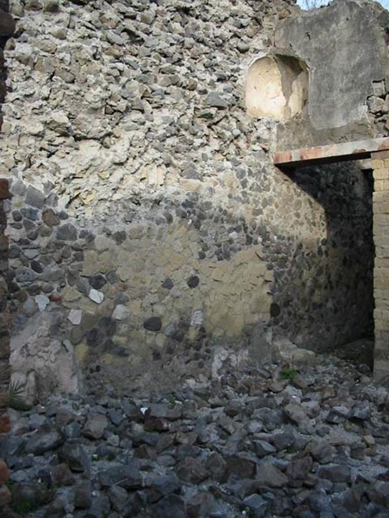 IV.6, Herculaneum, May 2003. Atrium, north-east corner, with doorway to small storeroom/cupboard.
Photo courtesy of Nicolas Monteix.