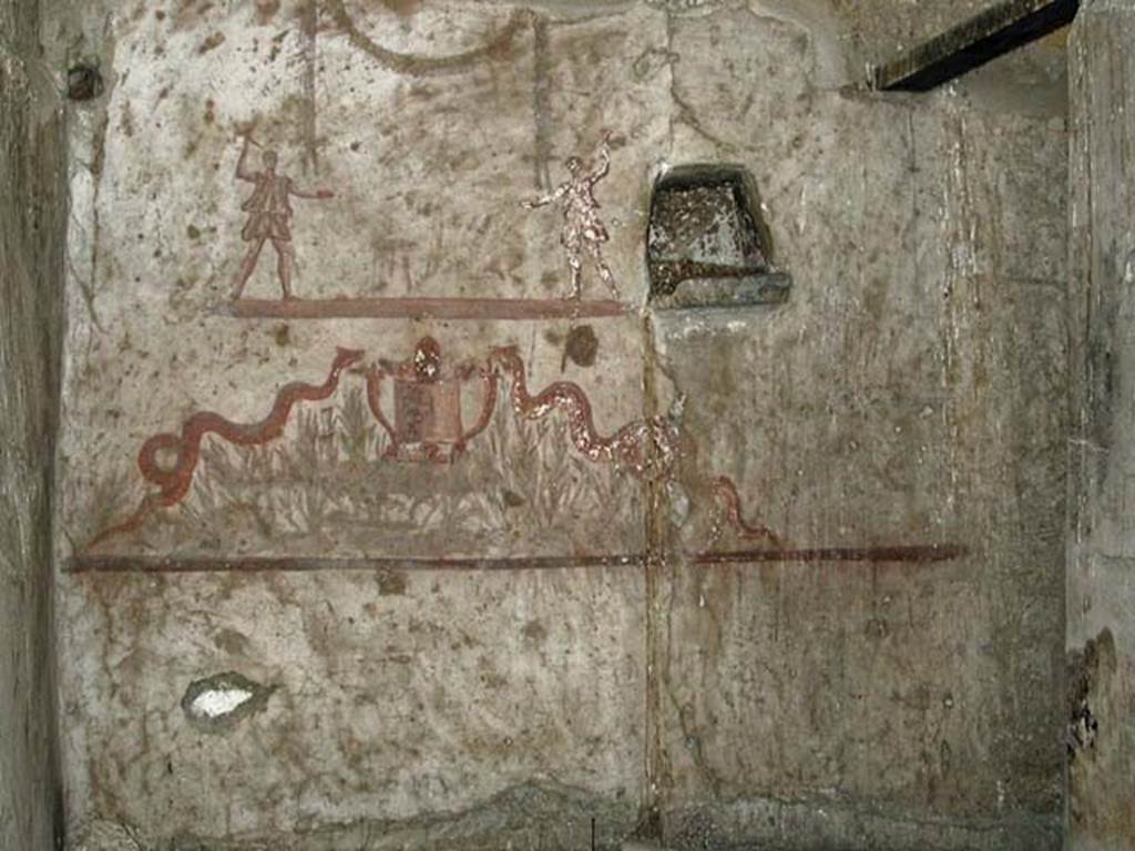 V.14, Herculaneum. September 2003. Detail of lararium on south wall of room 9.
Photo courtesy of Nicolas Monteix.