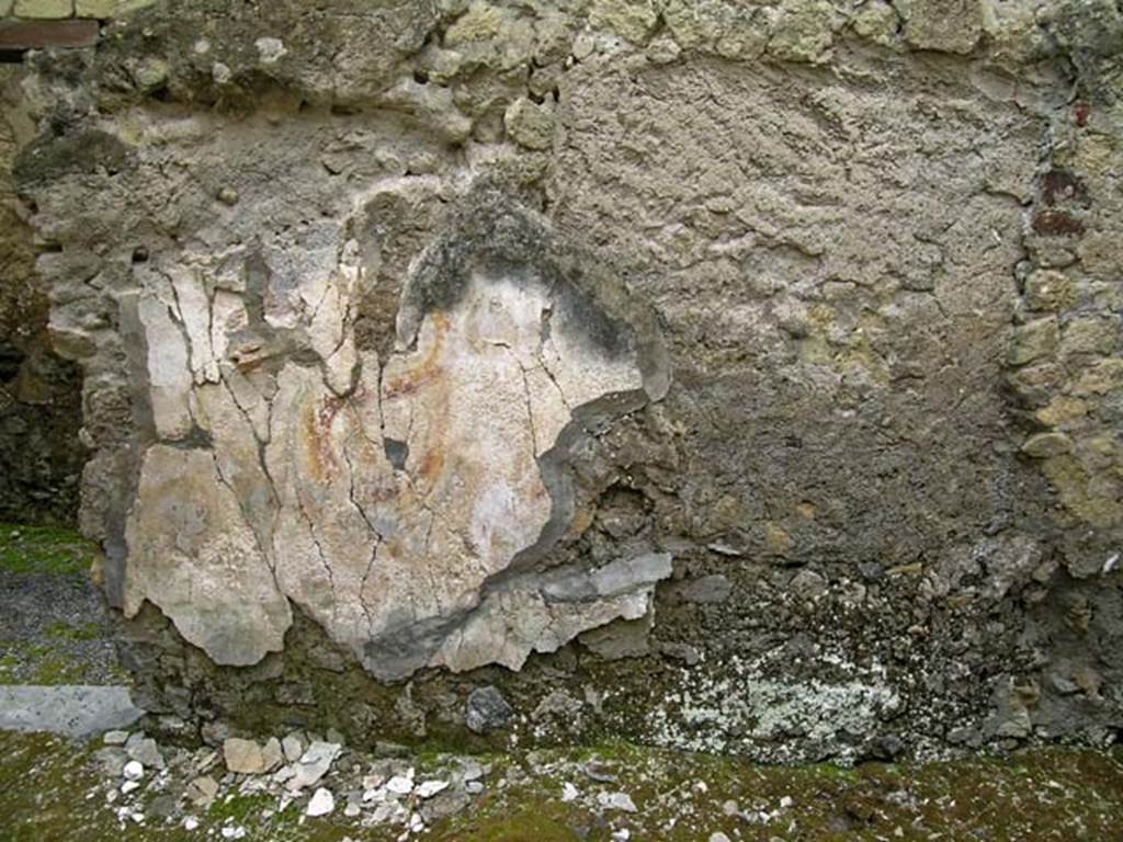 VI.17/26, Herculaneum. May 2004. Looking towards south wall with remains of lararium painting.
Photo courtesy of Nicolas Monteix.
