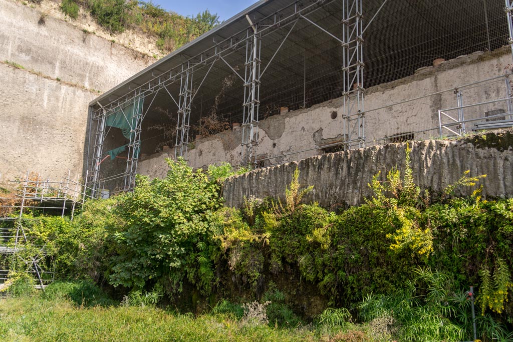 Herculaneum Villa dei Papiri. October 2023. 
Looking north-west towards area of atrium on upper floor above lower rooms. Photo courtesy of Johannes Eber. 
