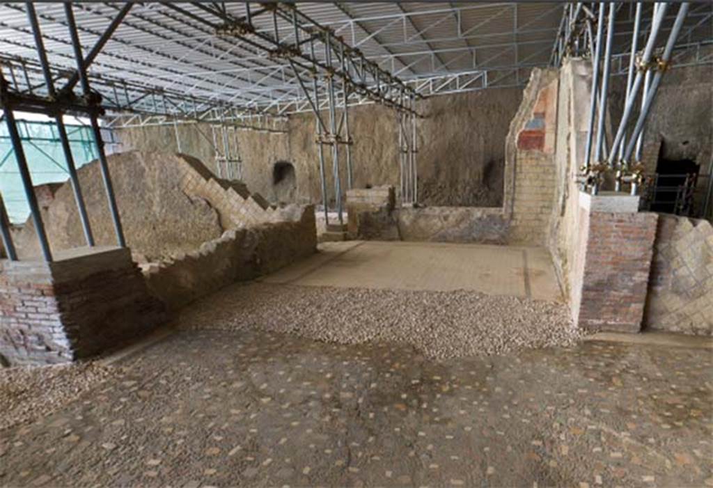 Villa dei Papiri, Herculaneum. 2009. Room (d), looking west from room (c), the atrium.
In the recent excavations three minor clearing surveys were carried out at the openings towards tablinum (b) and alae (d) and (e). During these surveys the remains of mosaics adorning the thresholds of these rooms, which were removed during the Bourbon exploration, were recovered. It is probable that these thresholds can be recognized among some of the flooring now stored in the apartments of the Reggia of Portici.
See Pagano, M. Mosaici romani nella reggia di Portici, in: Atti del VII Colloquia dell'Associazione italiana per lo studio e la conservazione del mosaico, Pompei, 22-25 marzo 2000, ed. by A. Paribeni (Ravenna 2001), esp. 337–338 and fig. 5 – 8.
See Esposito D. and Guidobaldi M., 2010. New Archaeological Research at the Villa of the Papyri, in the Villa of the Papyri at Herculaneum. Berlin: De Gruyter, p. 26, fig. 6, fig. 7, note 8.