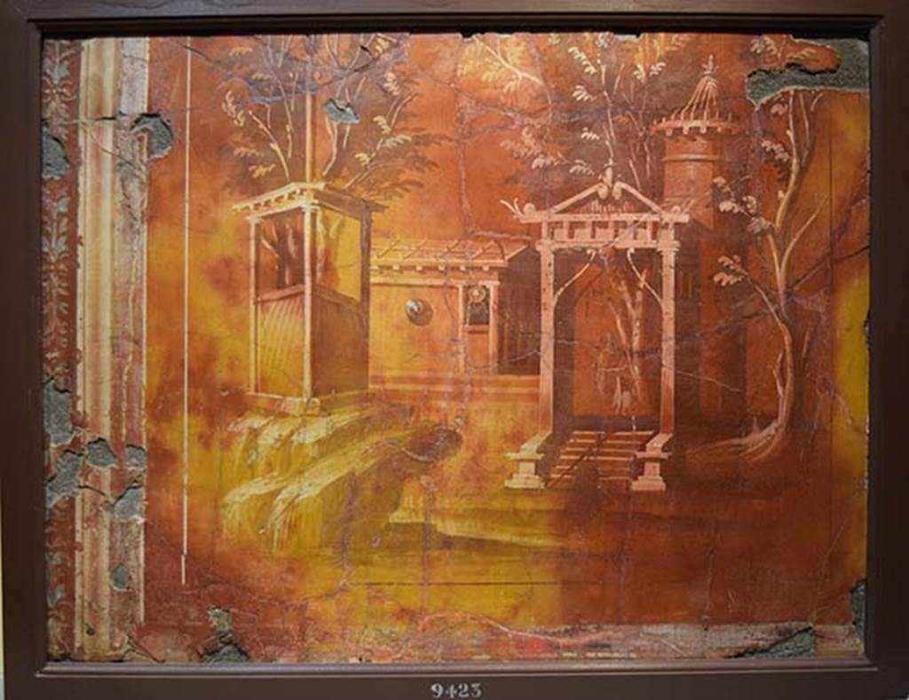 Villa dei Papiri, Herculaneum. North wall of ala, room (e). Fresco with sacred landscape and temples.
According to De Simone and Ruffo, this fresco came from this room.
Now in Naples Archaeological Museum. Inventory number 9423.
See De Simone, A. and F. Ruffo. Ercolano e la Villa dei Papiri alla luce dei nuovi scavi, CronErcol 33 (2003), p. 298.