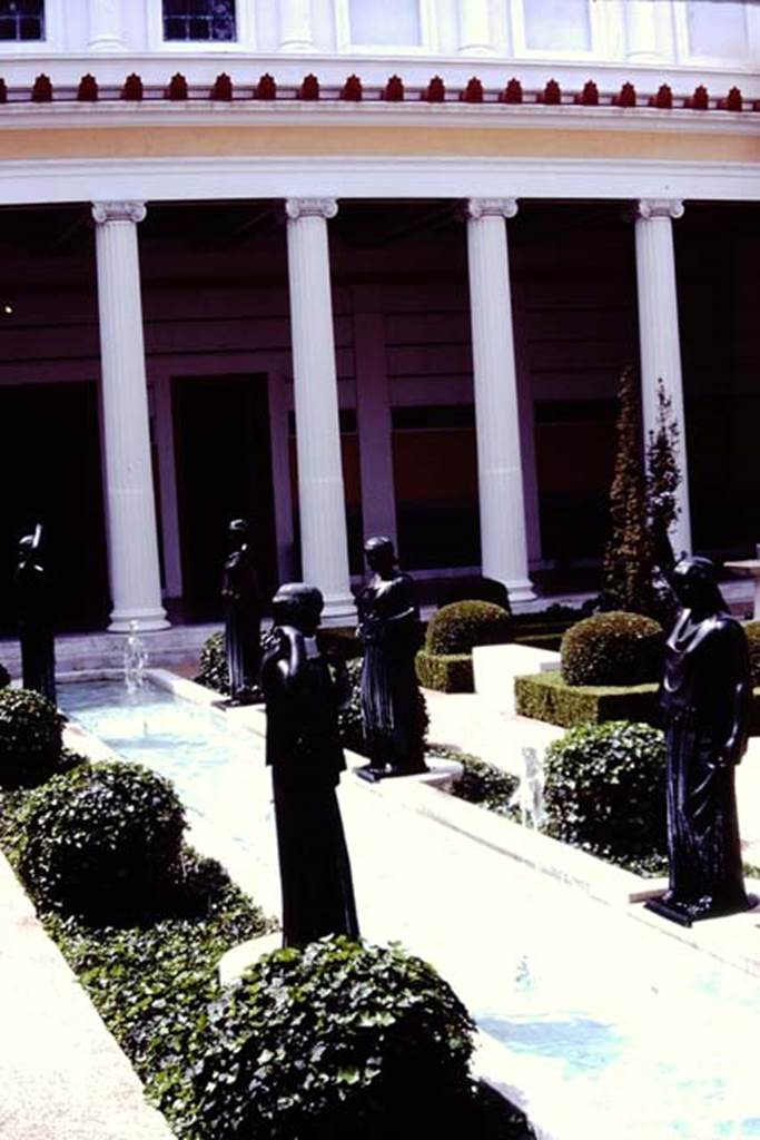 Getty Villa, Malibu, Spring 1982. Reproduction bronze figures at edge of pool.  Photo by Stanley A. Jashemski.   
Source: The Wilhelmina and Stanley A. Jashemski archive in the University of Maryland Library, Special Collections (See collection page) and made available under the Creative Commons Attribution-Non Commercial License v.4. See Licence and use details.
J80f0412
