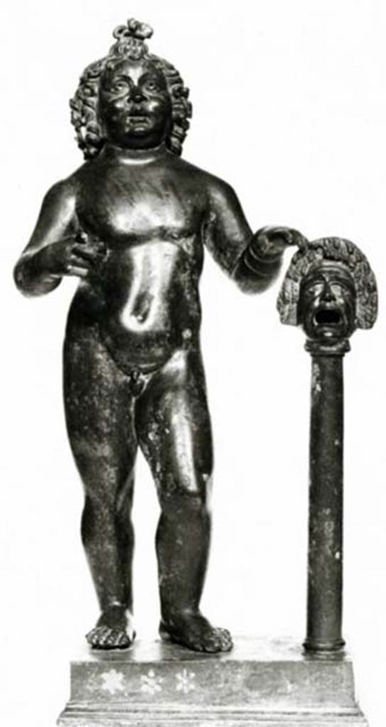 Villa dei Papiri, Herculaneum. Atrium. Bronze statue of cupid with left hand on mask found in 1754 round the impluvium.
Now in Naples Archaeological Museum. Inventory number 5028.

