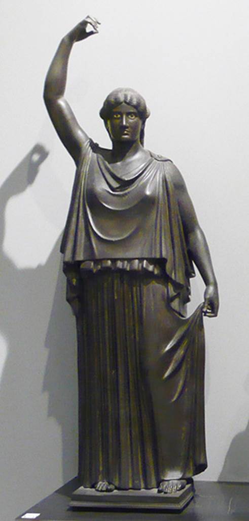 Villa dei Papiri, Herculaneum. Bronze statue of dancer.
Found in 1756, south side between the portico and the pond.
Now in Naples Archaeological Museum. Inventory number 5604.
Photo courtesy of Buzz Ferebee.
