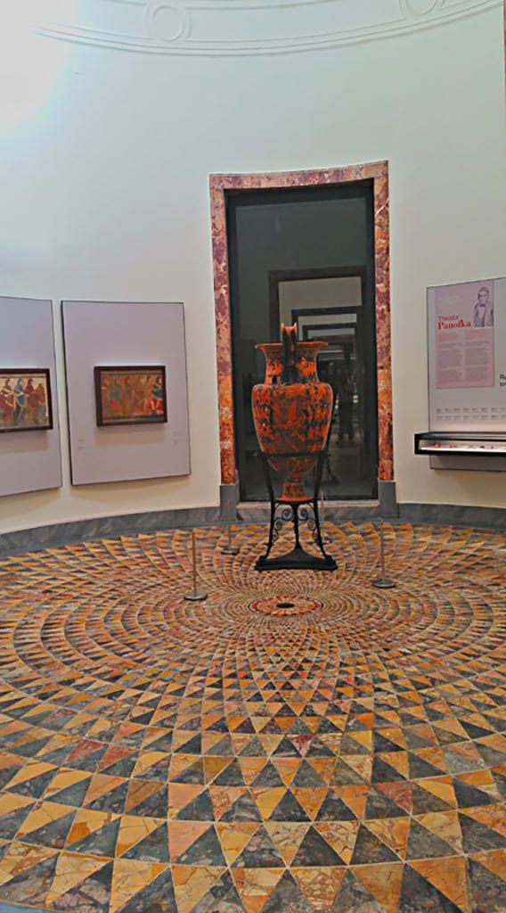 Villa dei Papiri, Herculaneum. July 2019.  
Circular polychrome mosaic floor in room CXXXIX, from the Belvedere.
It is now installed in a circular room, part of the “Magna Grecia” collection of Naples Archaeological Museum.
Inventory number s. n.  Photo courtesy of Giuseppe Ciaramella.

According to the description card in the Museum –
“Al II Complesso di Stabiae appartengono molti dei sectilia policromi, mentre da Ercolano proviene il meraviglioso pavimento circolare a file di triangoli concentrici, nella sala CXXXIX, rinvenuto nel 1751 nel cosiddetto Belvedere della Villa dei Papiri.”
(Many of the polychrome sectilia belong to the Second Complex at Stabia, while from Herculaneum comes the wonderful circular floor with rows of concentric triangles, in room CXXXIX, found in 1751 in the so-called Belvedere of the Villa of the Papiri). 


